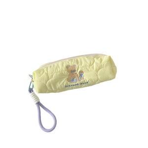 Quilted yellow cartoon bear pencil case with purple braided handle and embroidery