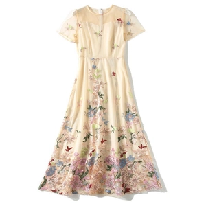 Elegant champagne high-waisted dress with colorful floral embroidery and mesh details