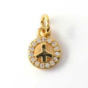 Golden peace symbol pendant with sparkling zircon accents and a minimalist design