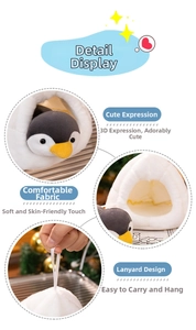 Detail of plush penguin toy featuring cute facial expressions and soft fabric texture