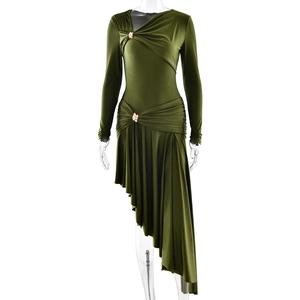 Detail of green long-sleeve dress with ruching, asymmetric hem and gold buckle accents