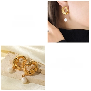 Detail of irregular 18K gold plated earrings with white teardrop pearl pendants