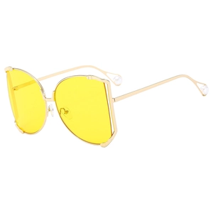 Chic square oversized sunglasses with yellow lenses, gold frame, and pearl details
