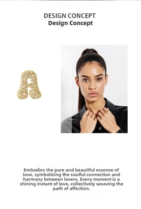 Detail view of gold letter A pendant with sparkling zircons worn by an elegant model