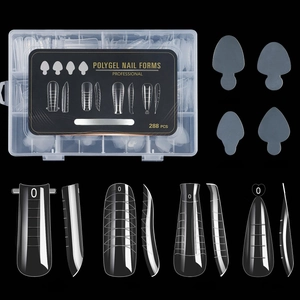 Macro view of clear nail extension molds with scale marks in a 288-piece diverse set