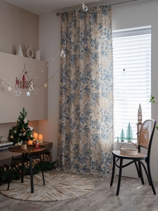 Detail of beige pine needle pattern kitchen curtain with decorative tassel fringe