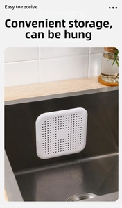 Copertura scarico in silicone bianco che mostra la funzione di stoccaggio appeso