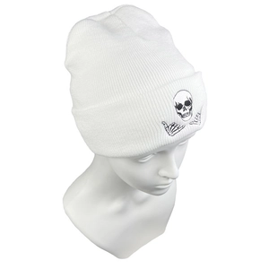 Close-up of white knit beanie featuring black skull and hand skeleton embroidery detail