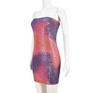 Detail of purple pink gradient sequin tube dress showing side slim fit cut and texture