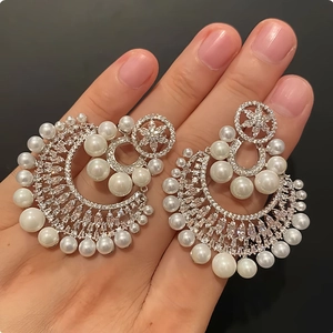 Elegant silver flower pearl stud earrings with zircon inlay and multi-layered luxury design
