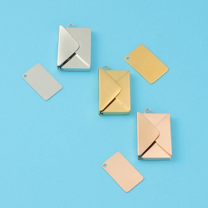 Polished stainless steel envelope and letter pendants in silver, gold, and rose gold finishes