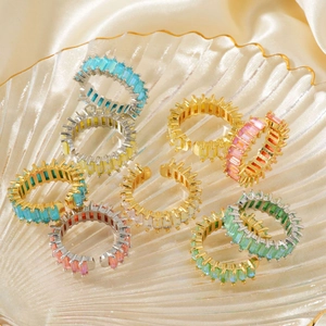 Colorful hip hop fashion rings in gold and silver set with vibrant gemstones