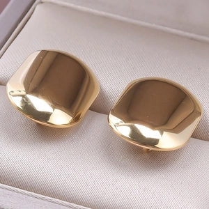 Detail of 304 stainless steel geometric square stud earrings with 18K gold polished finish