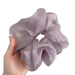 Elegant lavender organza hair scrunchie with shimmer texture for chic ponytail styles