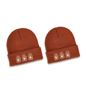 Caramel knitted beanie for men and women featuring three cute embroidered bears