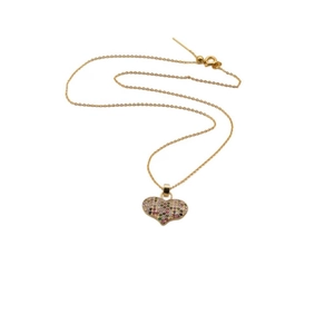 Elegant gold heart pendant necklace with colorful zircon stones on white background
