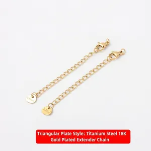 Detail of 18K gold plated stainless steel extension chains with lobster clasps and tags