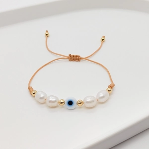 Handmade woven bracelet with Baroque pearls, Evil Eye bead, and adjustable gold beads