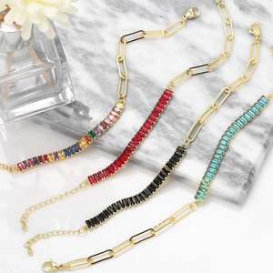 Detail showing multi-colored zircon stones and gold links of square bracelets