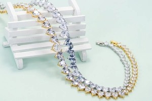 Hip hop heart necklace with full row of cubic zirconia in gold and silver finish