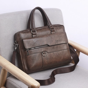 Brown vintage leather briefcase for men with top handle and adjustable shoulder strap