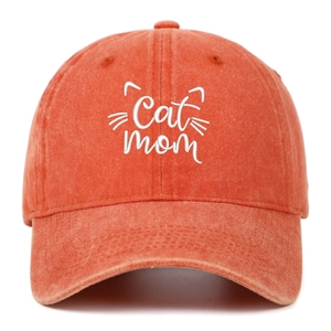 Detail of white Cat Mom embroidery on coral washed cotton vintage baseball cap