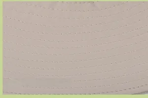Macro detail showing parallel stitching and dense fabric texture on large brim sun hat