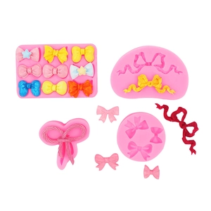 Set mit vier rosa Silikonformen in Schleifenform für Fondant und DIY-Handwerk