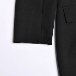 Detailed view of the cuffs and fabric texture of a sexy backless long sleeve mini dress