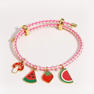 Detail of braided rope bracelet with colorful enamel fruit charms and golden slider