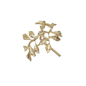 Minimalist gold leaf hair hook accessory for women with elegant branch and foliage design