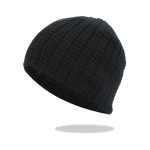 Detailed view of black ribbed knit beanie showing high-quality texture and stitching
