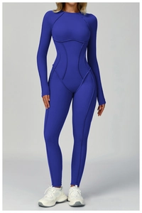 Macro detail of the curved contrast stitching on this deep blue yoga jumpsuit bodysuit