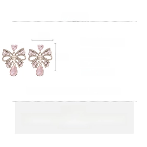 Detailed view of pink bow earrings with rhinestones, water drop gems, and size specifications