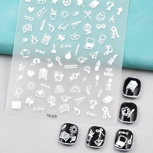 Detailed view of TS-225 white school-themed 5D nail art stickers with pencil and scissor icons