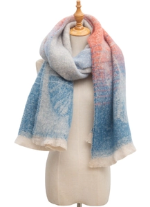 Close-up of jacquard ginkgo leaf pattern scarf on a mannequin in gradient fall colors