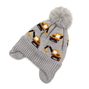 Grey knit winter hat for kids with yellow excavator pattern and large faux fur pompom