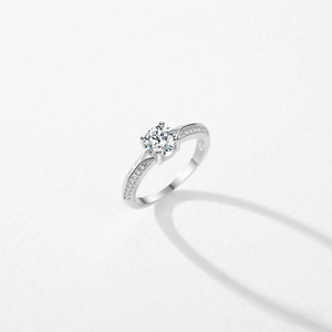Classic S925 sterling silver four-prong zircon ring with a large brilliant round center stone