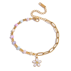 Detailed view of the flower pendant and mixed chain link design with 18K gold finish