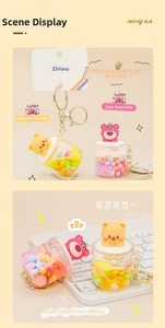 Detail view of cartoon liquid quicksand keychains with colorful oil and bear charms