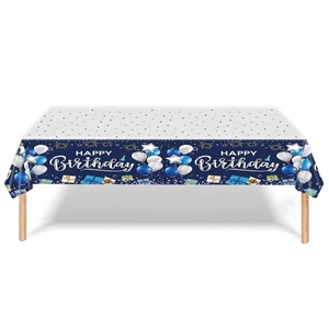 Detail of navy blue disposable tablecloth with Happy Birthday text and party balloons