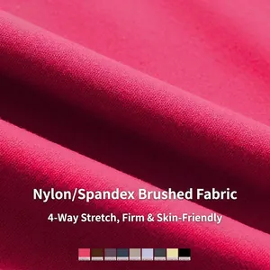 Completo yoga spazzolato color rosso rosa con tessuto elasticizzato e trama sulla pelle