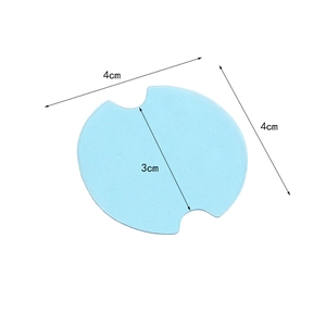 Light blue circular door handle protector with mesh texture, 4cm diameter dimensions