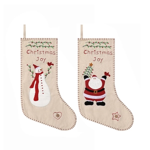 Ethnic Christmas stockings with embroidered Santa and Snowman for festive holiday decor