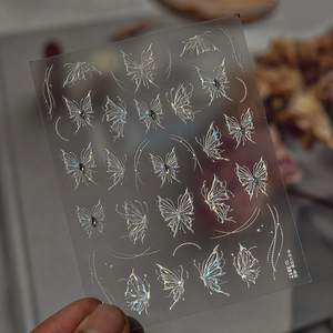 Detail of TO 3817 nail art sticker showing white crystal butterflies and rhinestones