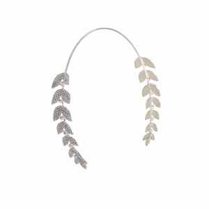 Detailed view of silver leaf headband with shimmering rhinestones for bridal hairstyle