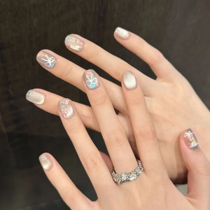 Short Aurora rose press-on nails with hand-painted bow and silver floral ring