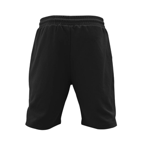 Detail of black waffle knit sports shorts showing texture and elastic waistband