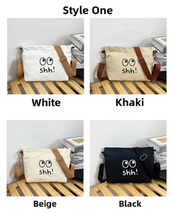 Detail view of canvas crossbody bags in four colors with smiley face and zipper closure