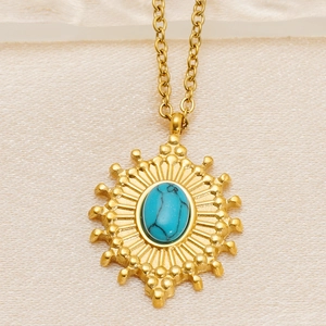 Vintage 18k gold plated stainless steel sunburst pendant necklace with blue turquoise stone
